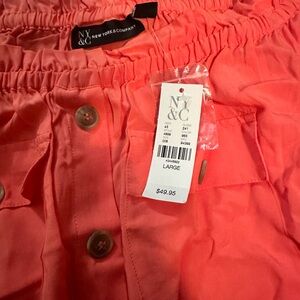 Peach colored top from New York and company, size large brand new never worn